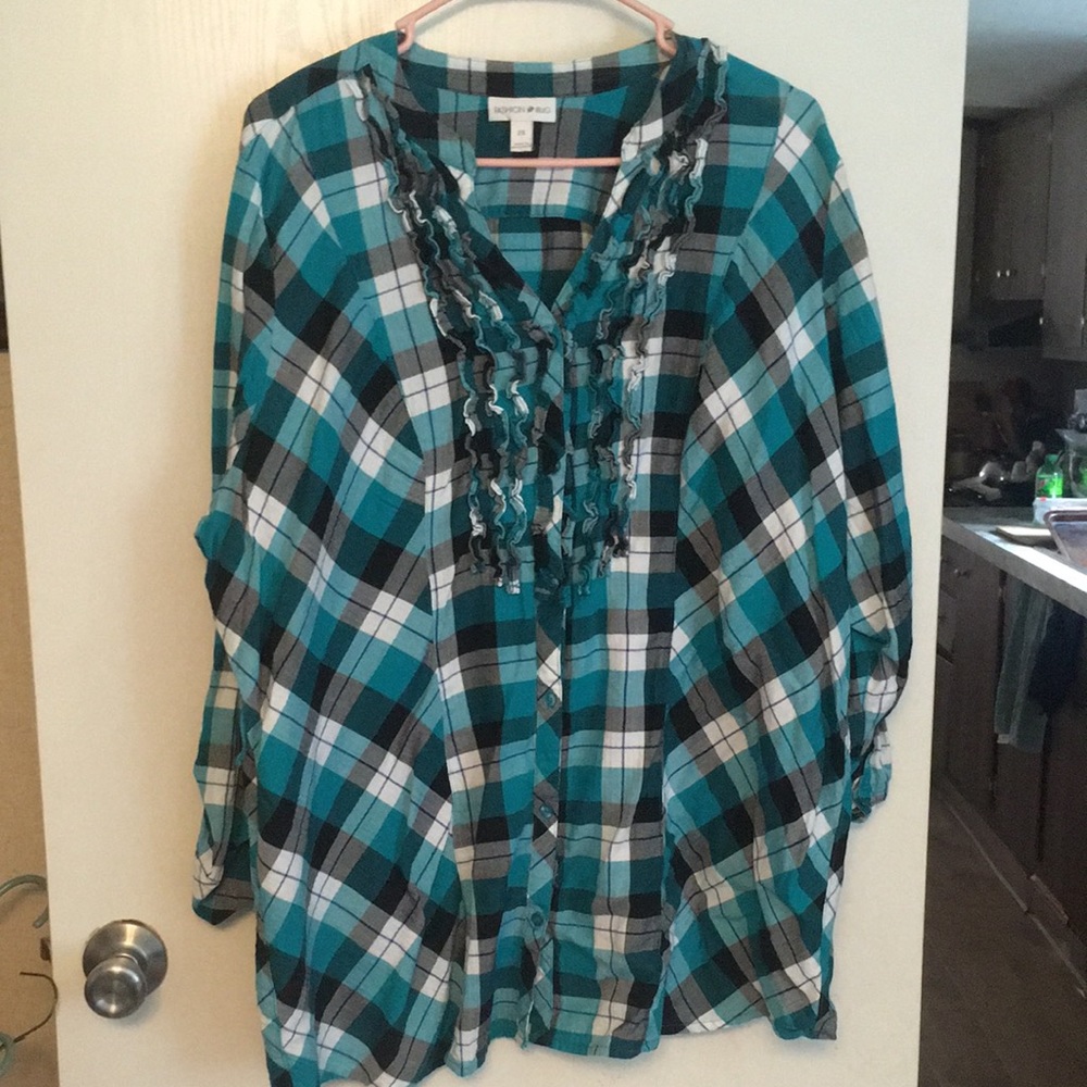 Beautiful plaid design with ruffles on the front